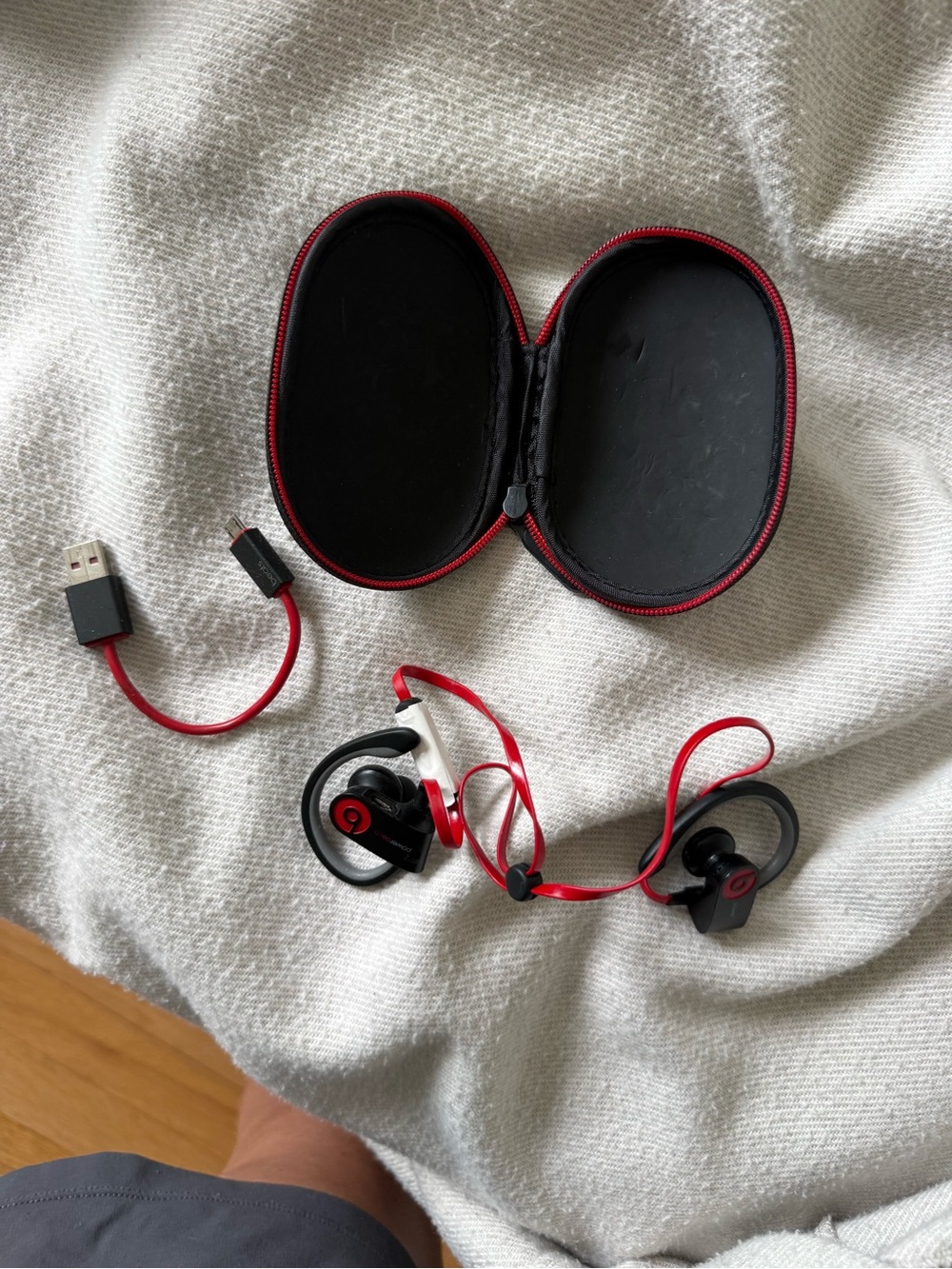 Powerbeats Wireless Earbuds in Black and Red